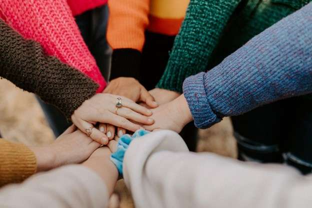 Hands together in a circle