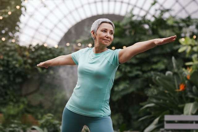 Older Adult in Warrior Pose Older Adult Woman in Warrior Pose